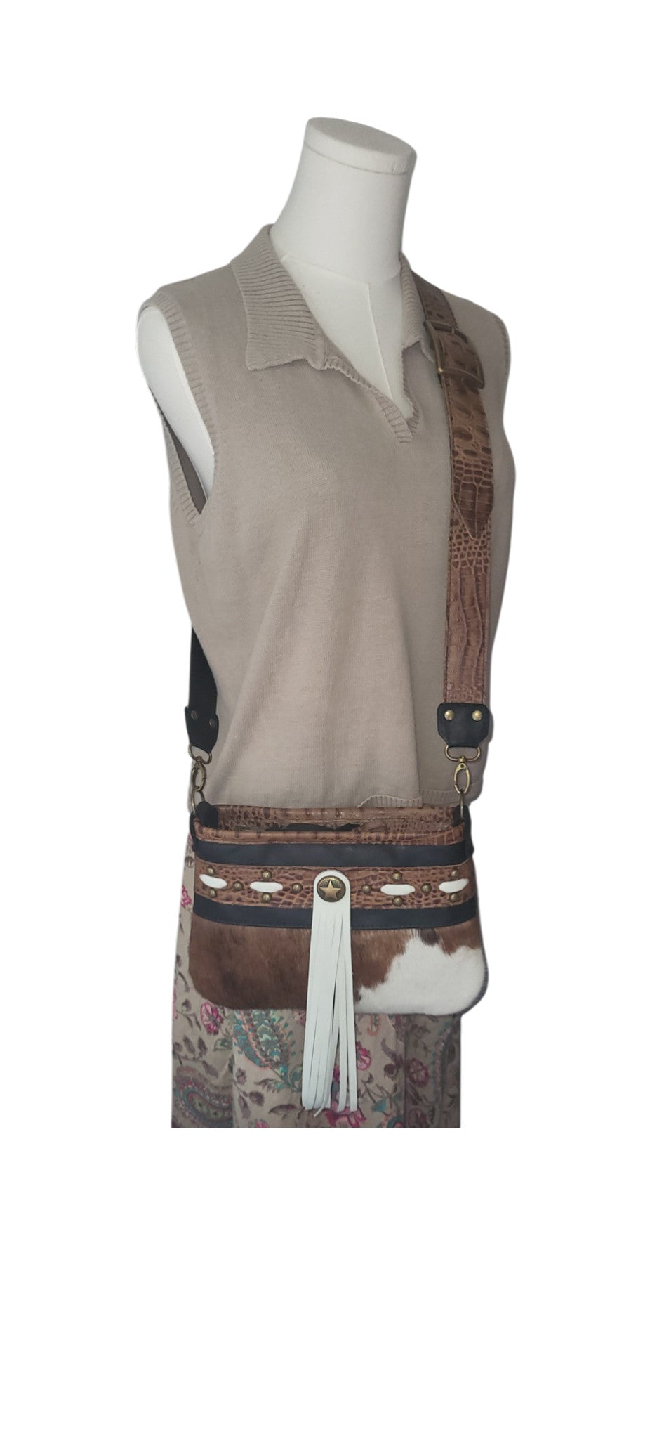 Western Belle in leather and brown/white cowhide.